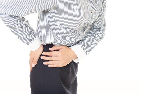 Woman who has back and hip pain