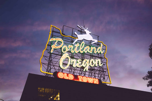 neon sign that says Portland Oregon