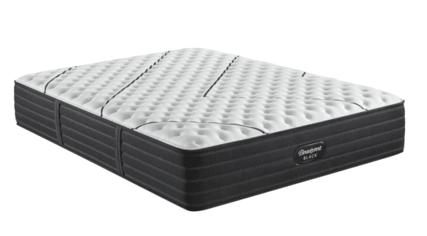 black mattress with white top and black line design