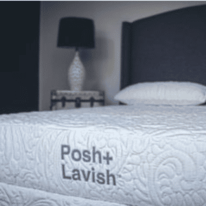 close up of left facing white embroidered mattress