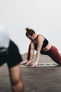 image of woman in yoga class