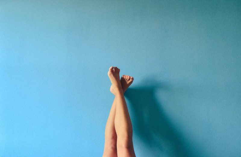 picture of legs on a blue background