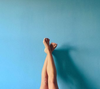 picture of legs on a blue background